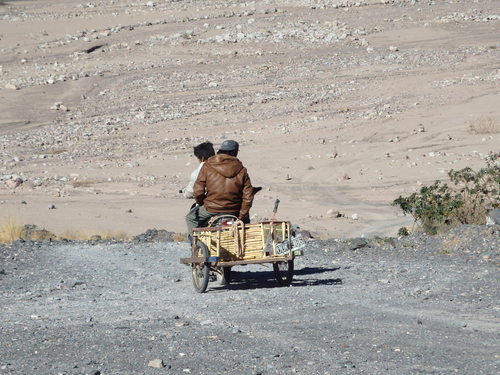 Two adventurous young men are heading up the turn-off for Huachichocana.